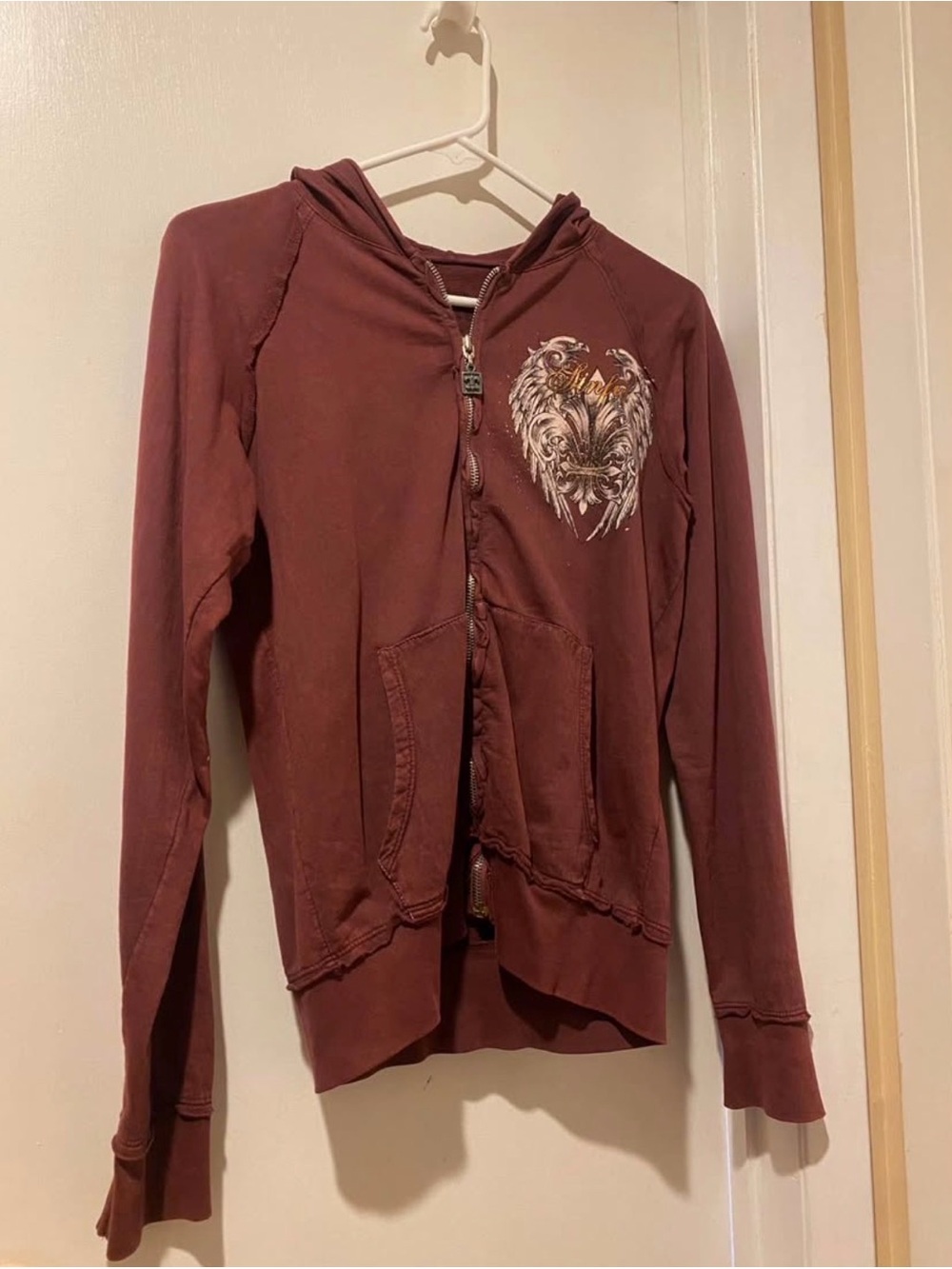 Sinful Maroon Zip-Up Hoodie with Winged Heart Graphic